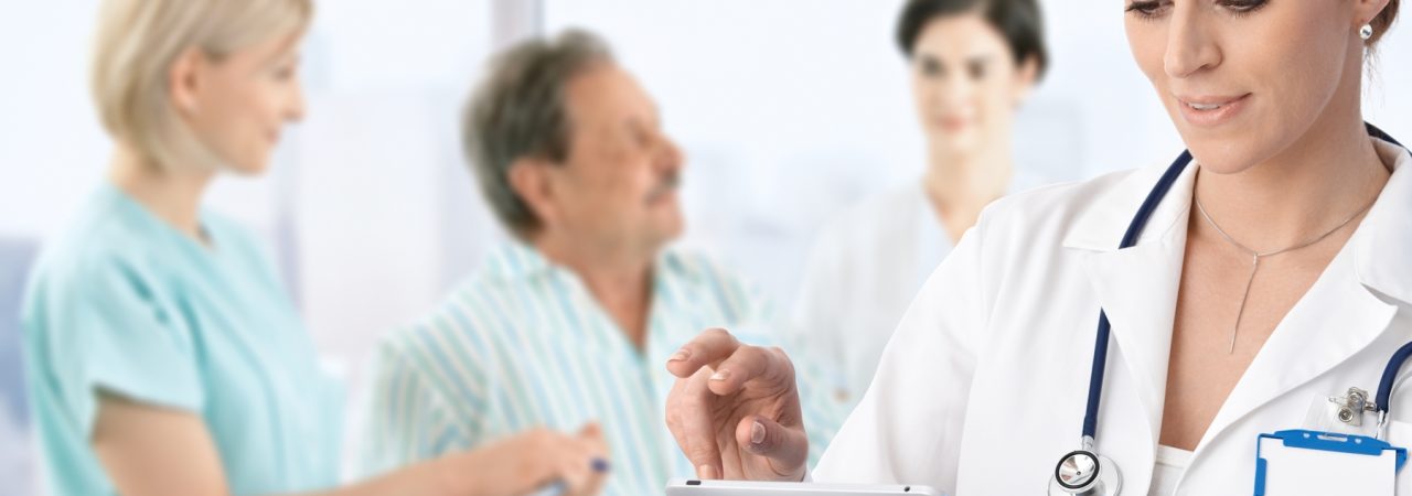 Doctor-with-Ipad - w1800